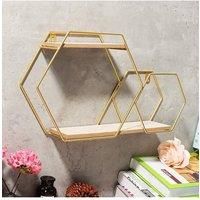 https://www.burton.co.uk/product/living-and-home-2-tier-wall-floating-shelf-modern-hexagonal-plant-stand_p-470128d4-c5fb-4ebc-8ca7-0b5b7c83f8eb£colour=Gold&size=One%20Size
