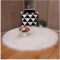 https://www.burton.co.uk/product/living-and-home-dia-90cm-white-round-soft-plush-decor-area-rug_p-1a69f928-81c5-48d0-89bd-3f2bd69da187£colour=White&size=90cm%20diameter