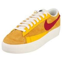 Nike Blazer Low Platform trainers in brown and orange