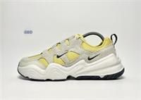 Nike tech hera trainers in stone multi