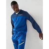 New Balance Mens Reimagined Woven Graphic Jacket - Blue