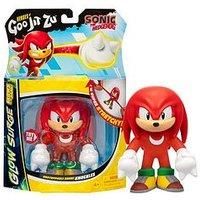 Heroes of Goo Jit Zu Unstoppable Surge Knuckles, Powered Up With Glow Surge Giving Him Glow-in-the-Dark Powers