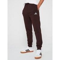 adidas Men/'s Essentials Fleece Regular Tapered Pants, Shadow Brown F23, XS