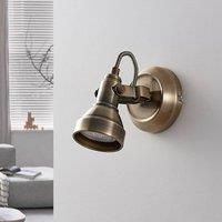 Lindby Perseas wall spotlight, antique brass