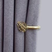 Mix and Match Antique Brass Equatorial Leaf Pair of Holdbacks