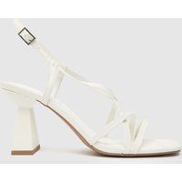 schuh scarlett flared block high heels in white