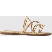 schuh Tevin Strappy Mule Sandals in Gold
