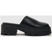 schuh tinsley closed toe chunky mule sandals in black