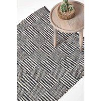 Homescapes Real Leather Handwoven Striped Block Check Rug in Black | Size: 150cm x 240cm