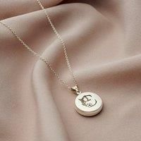 Posh Totty Designs Women's Sterling Silver Floral Engraved Initial Circle Locket Necklace