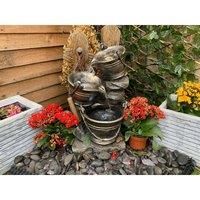 Tranquility Metal Pouring Jugs Solar Powered Water Feature