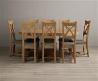 Extending Helmsley Oak Pedestal Dining Table with 4 Black Natural Solid Oak Chairs