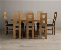 Extending Helmsley Oak Pedestal Dining Table with 8 Black Natural Solid Oak Chairs