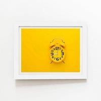Warren Reed - Designer Yellow Alarm Clock Framed Art Print in White | Size: W12" x H16"