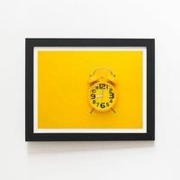 Warren Reed - Designer Yellow Alarm Clock Framed Art Print in Black | Size: W20" x H30"
