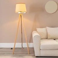 https://www.burton.co.uk/product/valuelights-barbro-light-wood-tripod-floor-lamp-with-natural-linen-scallop-edge-shade_p-a98a815e-e48e-42f9-ba39-082b9dcacdb2£colour=Burnt%20Orange&size=One%20Size