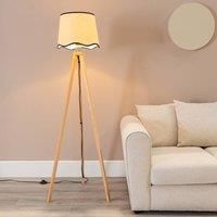 https://www.burton.co.uk/product/valuelights-barbro-light-wood-tripod-floor-lamp-with-linen-scallop-edge-shade-and-led-bulb_p-812055bd-396e-4ca9-8189-c91b0c2cc2d9£colour=Black&size=One%20Size