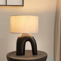 https://www.burton.co.uk/product/valuelights-lia-fabric-drum-lamp-shade-black-arch-abstract-ceramic-table-lamp_p-b8ac38ce-f694-4705-a999-ad529e0fd32f£colour=Grey&size=One%20Size