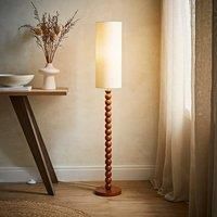 https://www.burton.co.uk/product/valuelights-wyatt-natural-linen-tall-lamp-shade-walnut-wood-bobbin-floor-lamp-with-led-bulb_p-e5920574-c559-477f-bbfd-2afcc98f90cd£colour=Natural&size=One%20Size