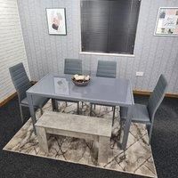 Dining table with 4 grey leather chairs and a bench kitchen dining