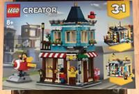LEGO 31105 Creator 3-in-1 Townhouse Toy Store, Cake Shop, Florist Building Set, with Working Rocket Ride