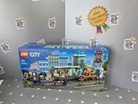 LEGO 60335 City Train Station Set with Toy Bus for Kids, Rail Truck, Tracks and Road Plate Level Crossing, Compatible with City Sets