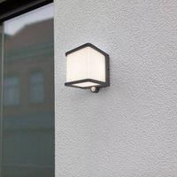 LUTEC Doblo LED solar wall light with a motion detector