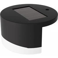 Solar powered round wall lights with milky white lamp shades, suitable for courtyards, fences and staircases.