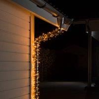 Konstsmide 3613-800 Christmas Lights/LED Fairy Lights/Christmas Tree Lights Outdoor or Indoor (IP44)/24V Transformer Plug In/200 Amber White Diodes/Black Cable String Lights