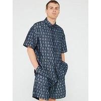 A | X ARMANI EXCHANGE Men/'s Short Sleeve All-Over Logo Denim Button Down Shirt. Regular Fit, Indigo Jacquard, S