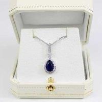 Blue Sapphire Pear Cut Pendant Necklace - White Gold