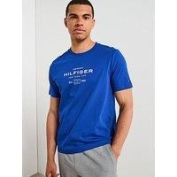 Tommy Hilfiger Men’s Short Sleeve Round Neck Stack Graphic T-Shirt, Blue (Wedge Blue), L